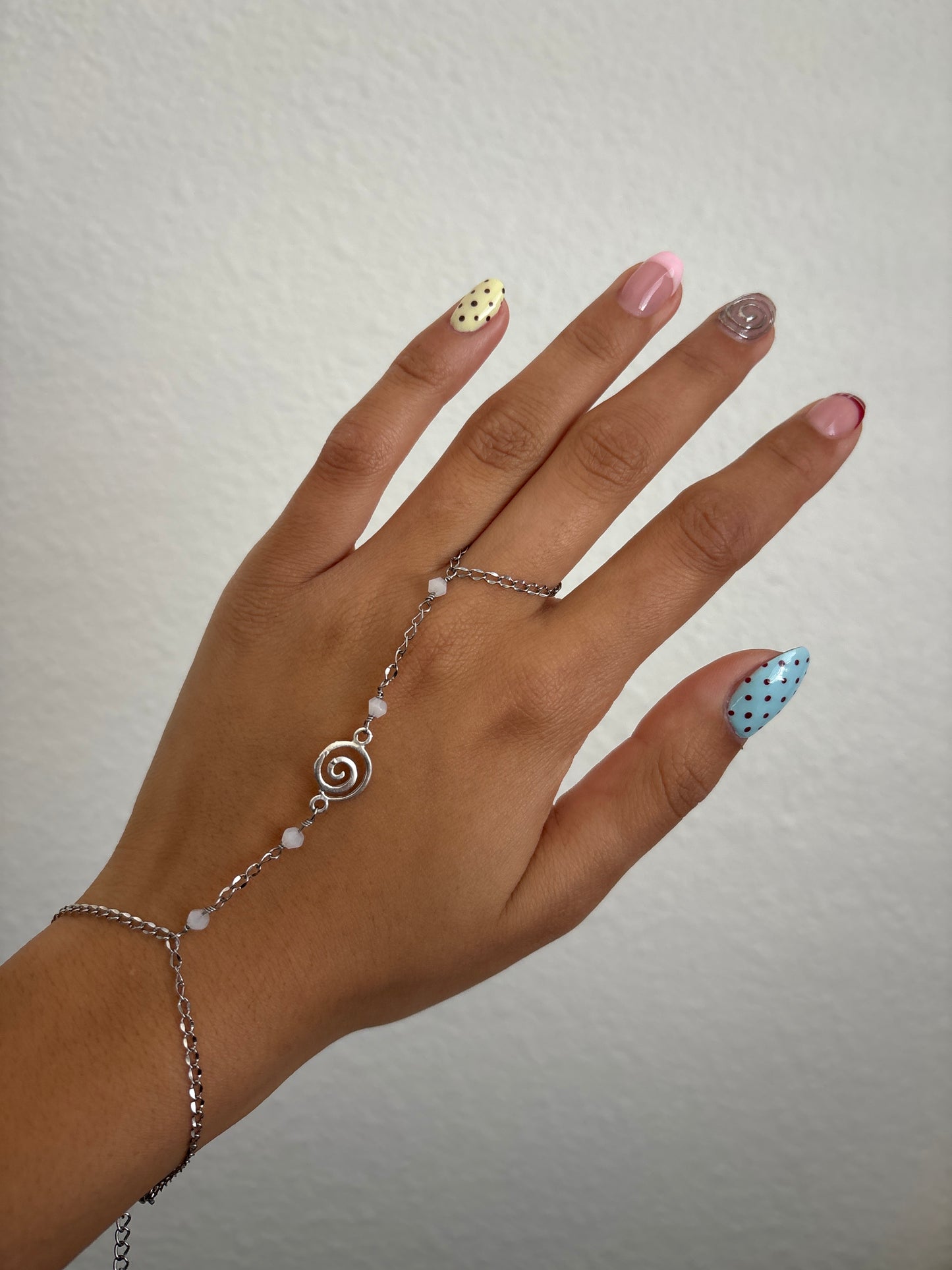 White Spiral Silver Hand Chain