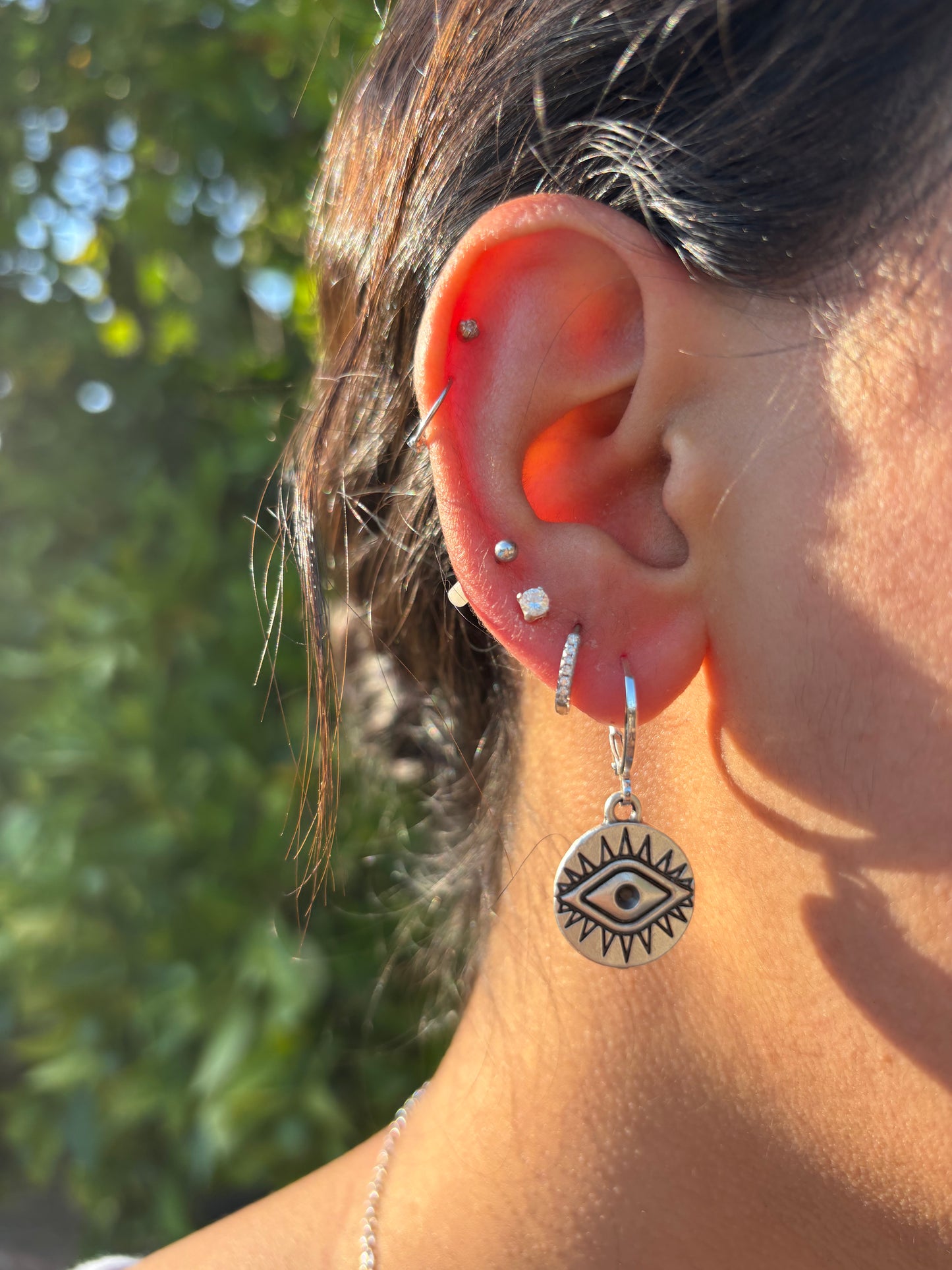 Round Eye Silver Huggie Earrings