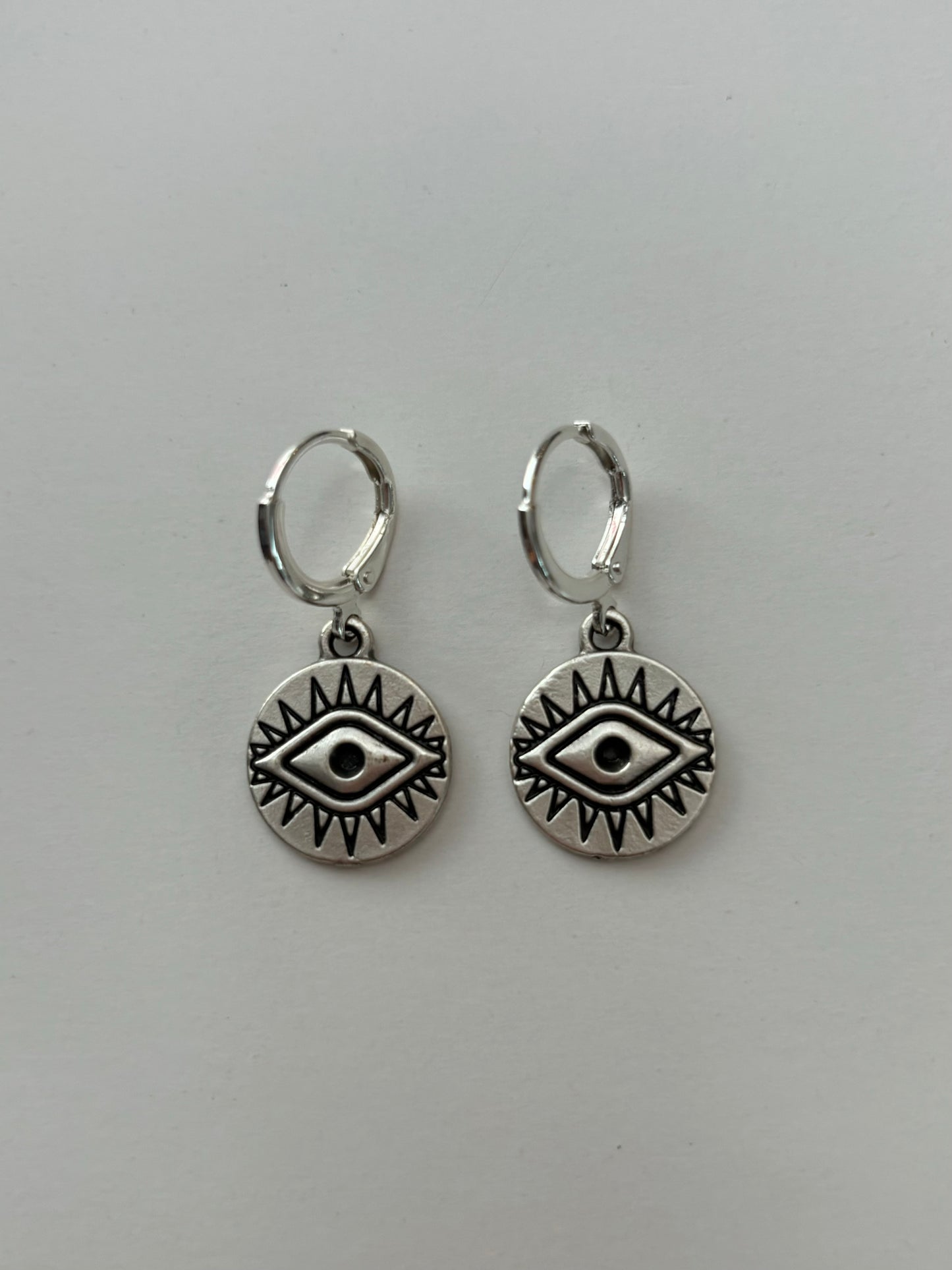 Round Eye Silver Huggie Earrings