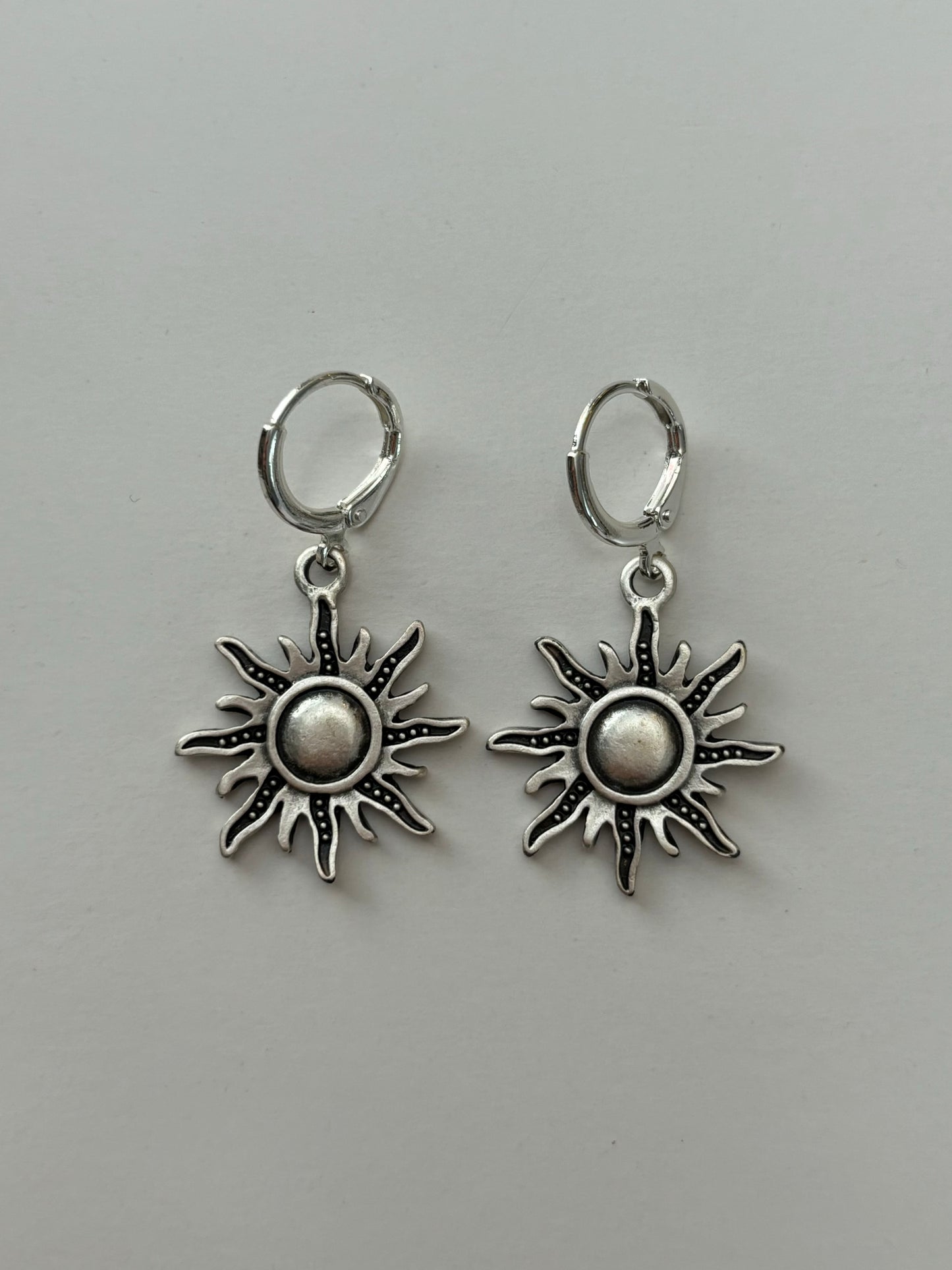 Big Sun Silver Huggie Earrings